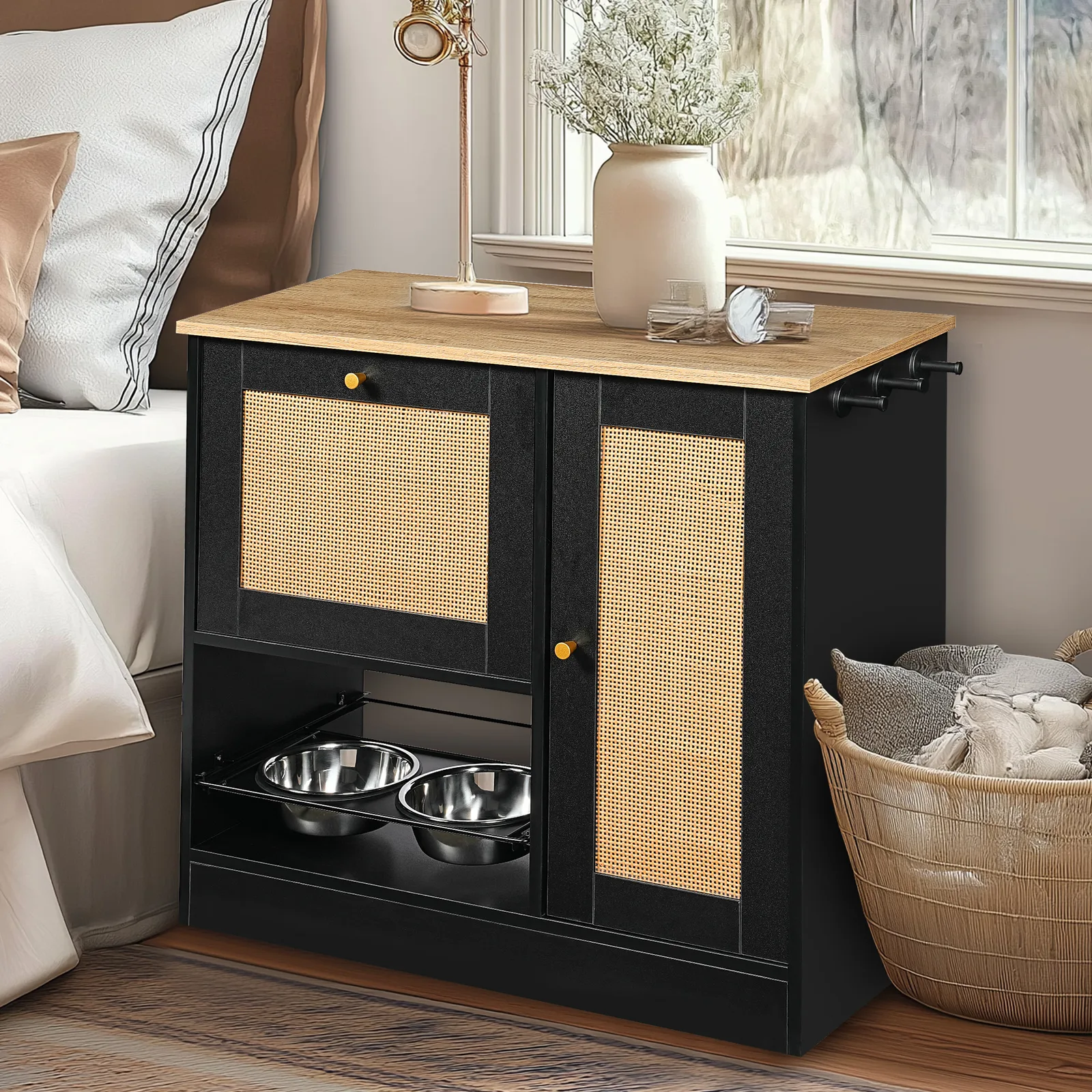black vintage cabinet styled as a sideboard in a bedroom