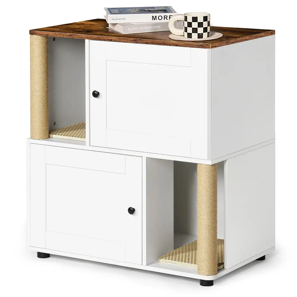 Top of the double cat litter box enclosure styled with books and a mug