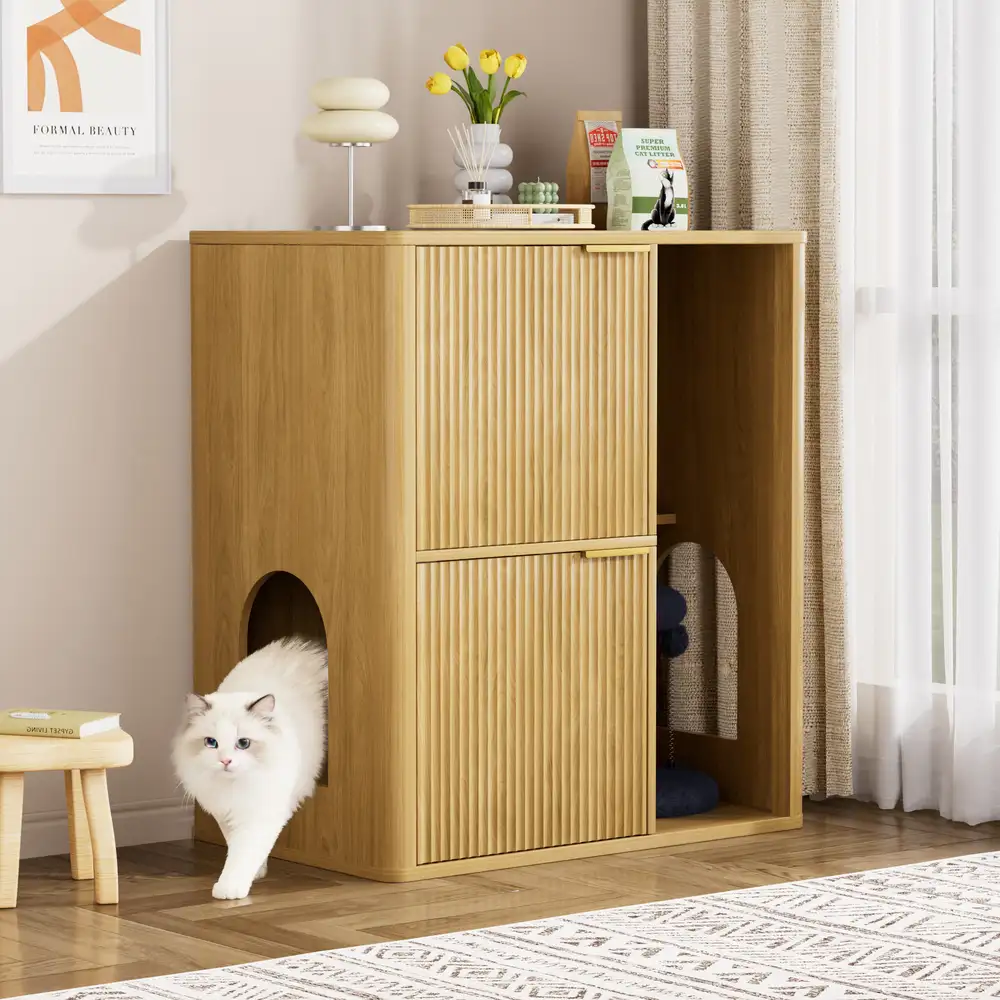 Natural wood finish cat litter box cabinet with white cat walking through the arched side entry