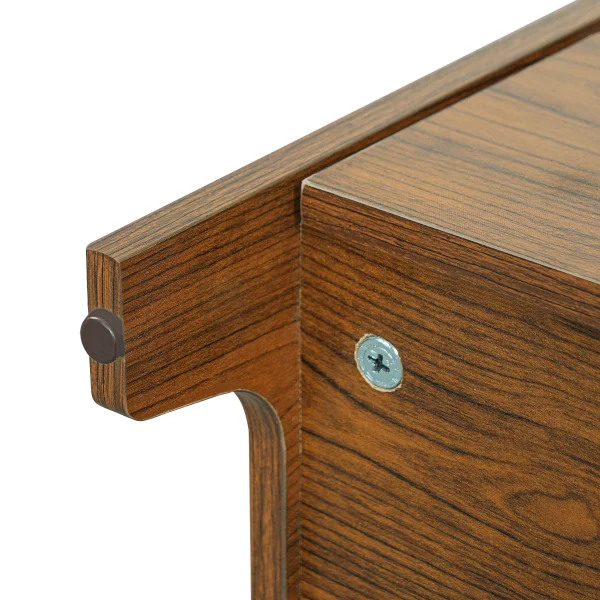 Protective rubber pad and screw detail on the cat litter box enclosure door
